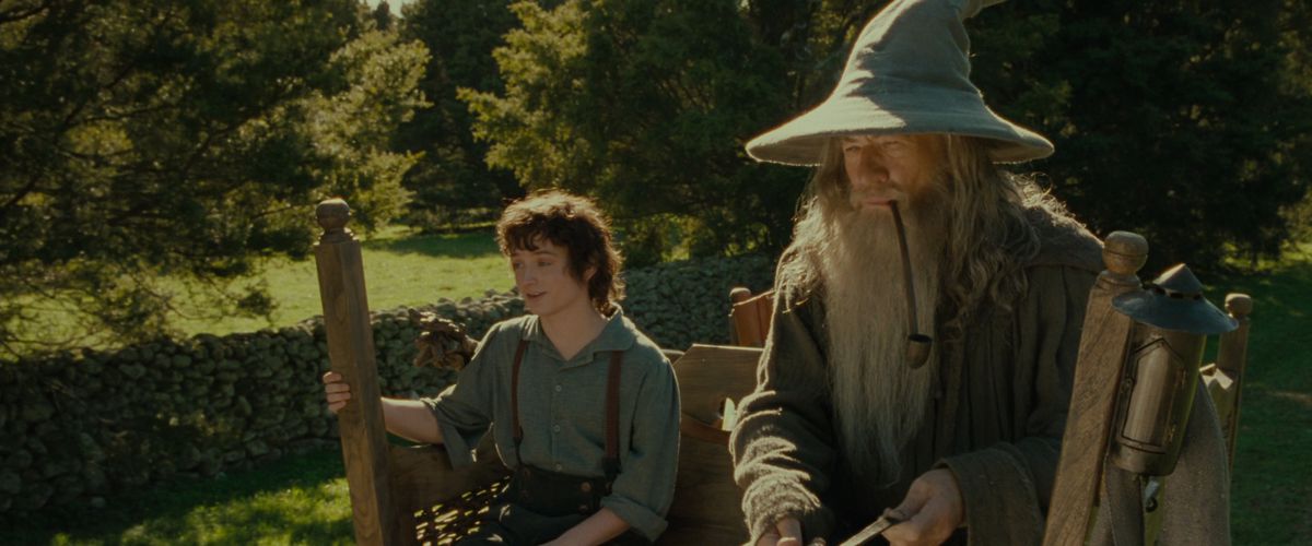 frodo and gandalf ride on a car in fellowship of the rings the lord of the rings