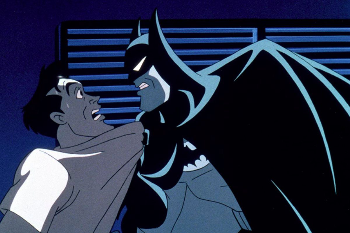 Batman interrogates corrupt city official Arthur Reeves