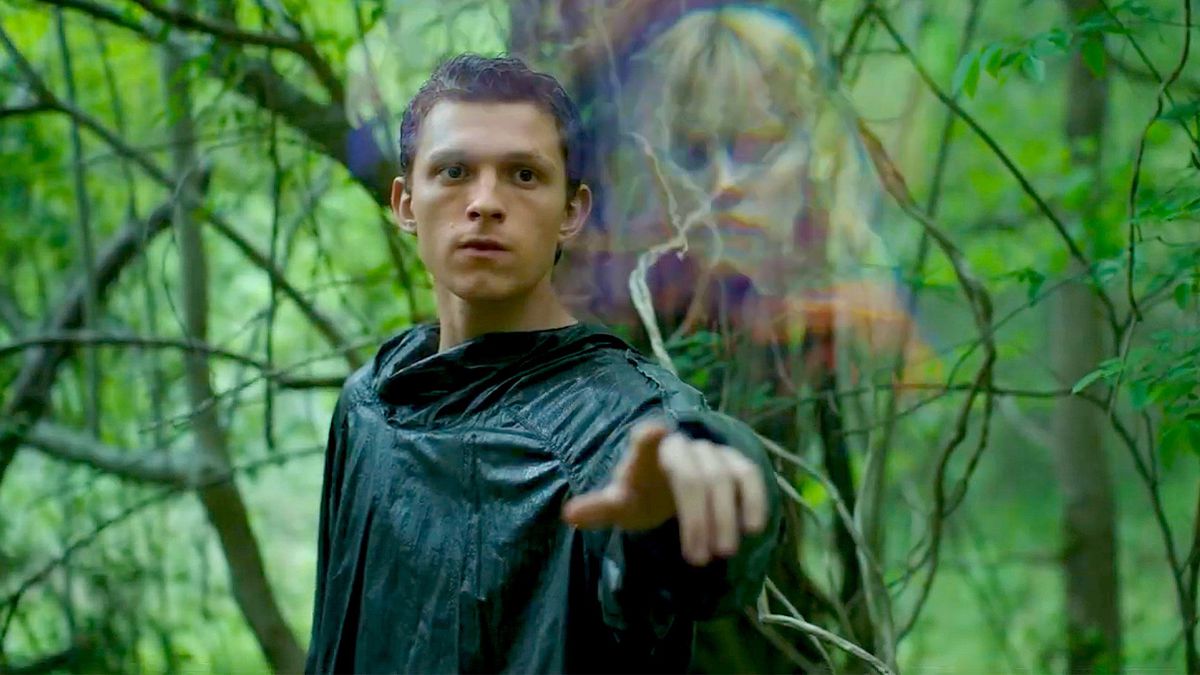 Tom Holland touching an apparition of Daisy Ridley in Chaos Walking
