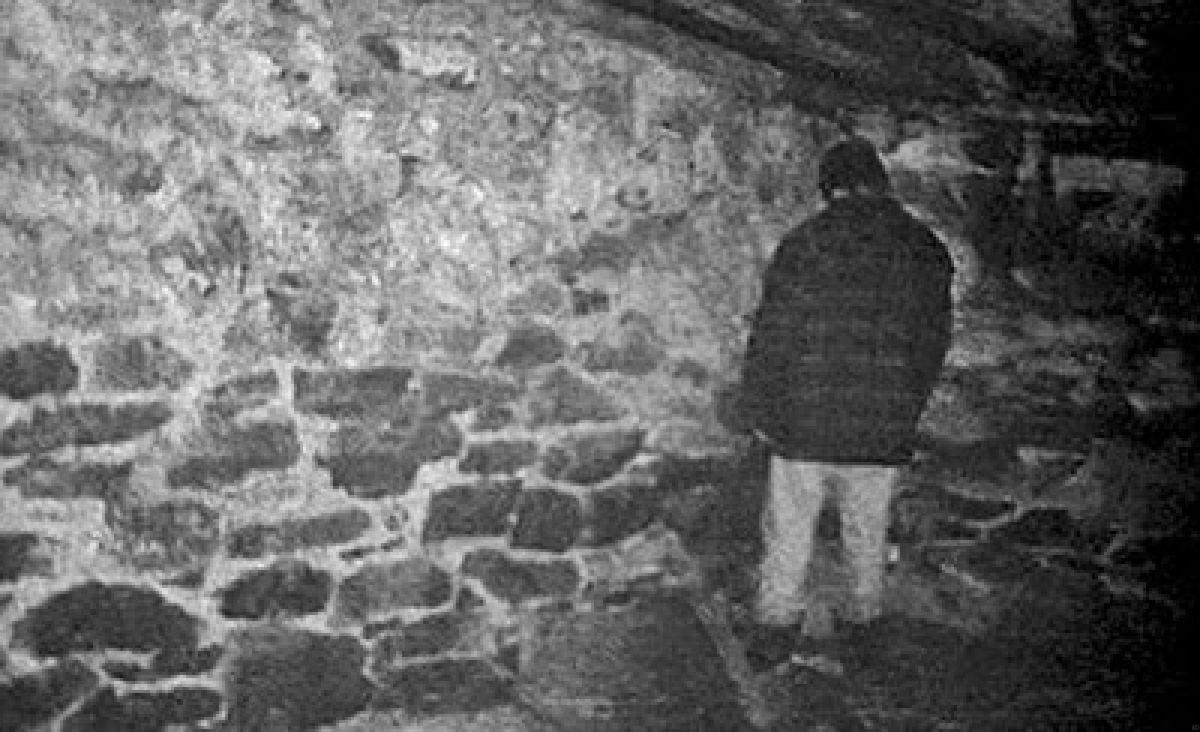 Mike standing in a corner in The Blair Witch Project