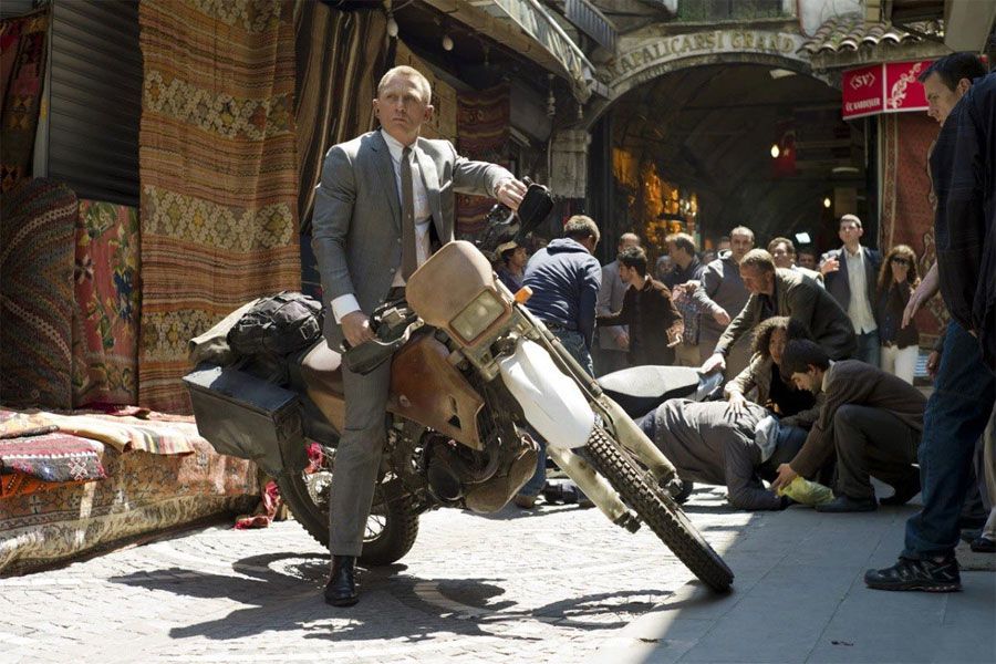 Daniel Craig as James Bond (007) on a motorbike in Skyfall