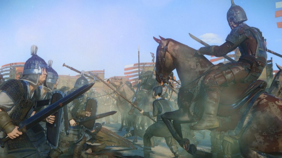 a bloodied man on a horse faces off against an armoured man on foot