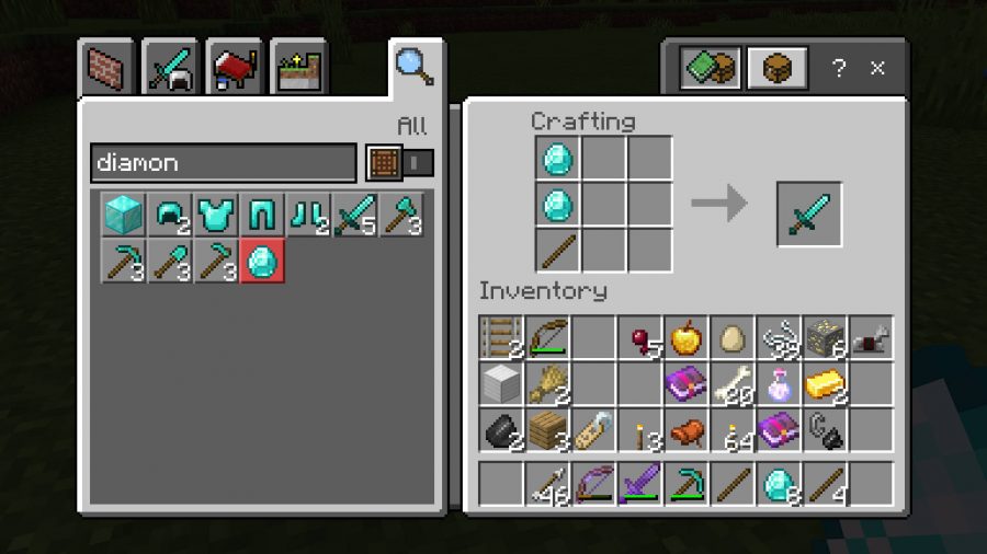 Player is crafting a diamond sword in Minecraft. It requires one stick and two diamond ore to make.