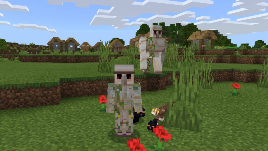 Player has a golem skin in Minecraft. He is standing next to a real golem and a bunch of cats.