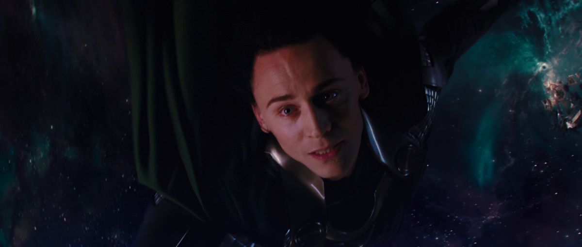 Loki hangs from the Rainbow Bridge in Thor (2011). 