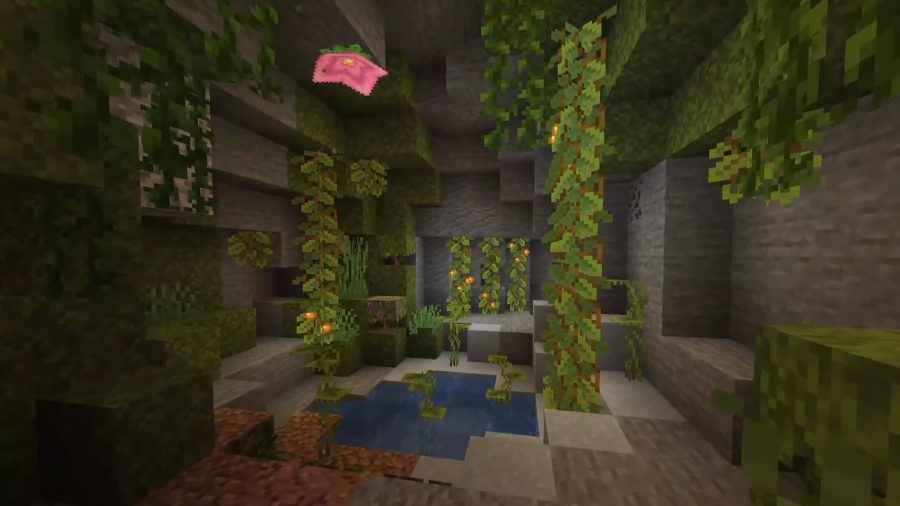 The Lush Caves are home to several plants, including berries growing on vines and large pink flowers that emit particles from the ceiling.