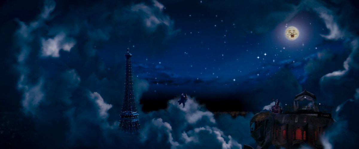 Ewan McGregor and Nicole Kidman dance in the sky in an enchanted Paris while the moon sings overhead in Moulin Rouge