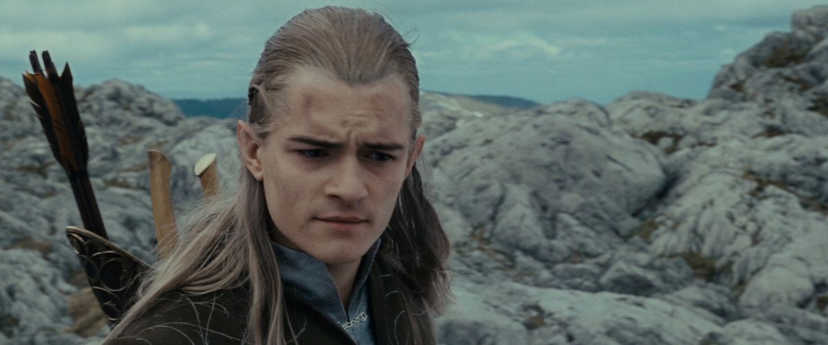 Legolas looks mostly confused as the rest of the Fellowship collapses in tears after Gandalf’s death in The Fellowship of the Ring.