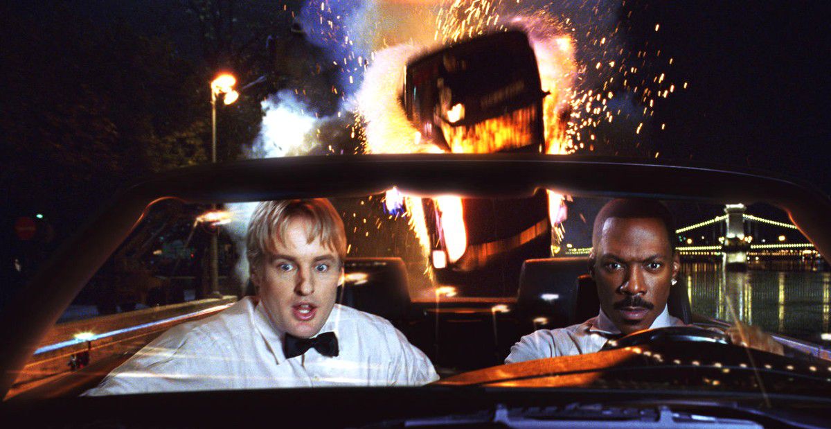 Owen Wilson and Eddie Murphy drive away from an explosion in 2002’s I Spy