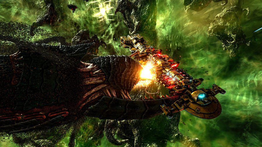 A tyranid ship eats another ship in warhammer game battlefleet gothic armada 2