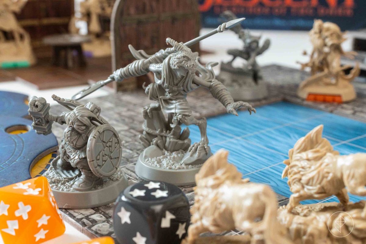 A dragon and a dwarf face down a pair of wolves.