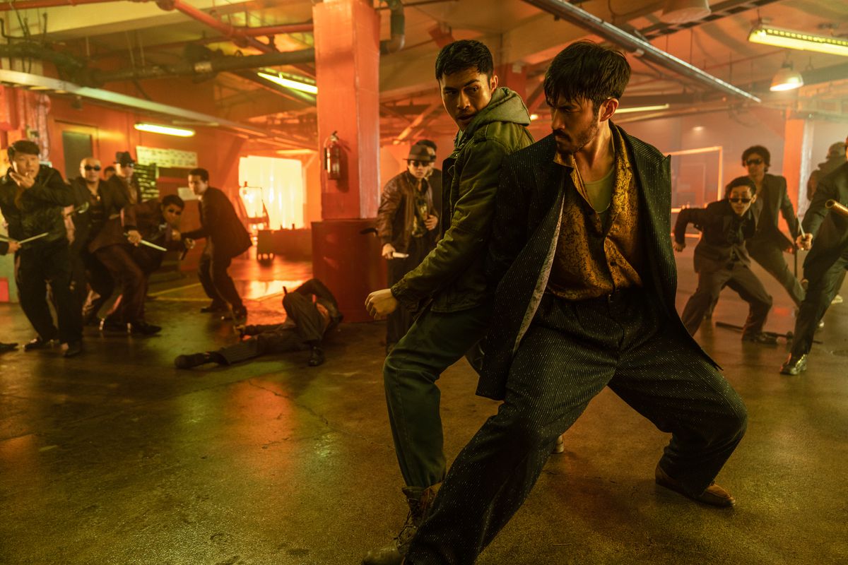 Henry Golding plays Snake Eyes and Andrew Koji plays Tommy/Storm Shadow fend off ninjas in Snake Eyes