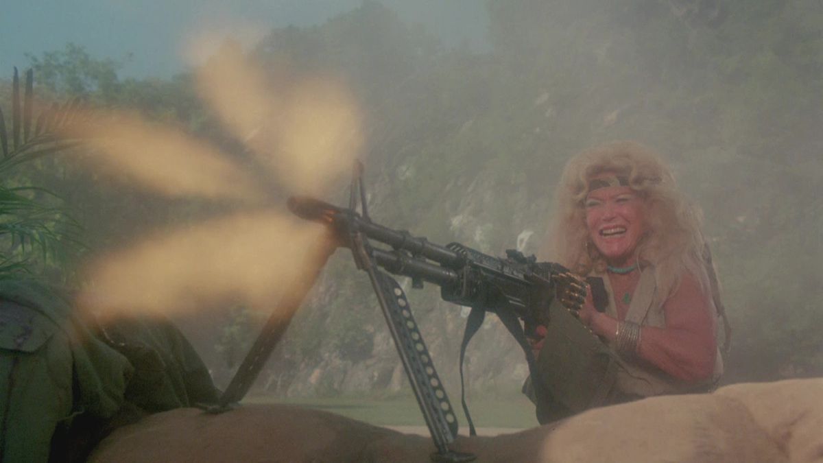 An old lady fires a giant machine gun in Troma’s War