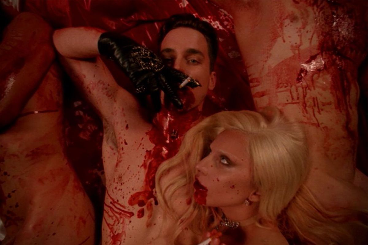 two naked vampires aka the afflicted in a pile of blood in american horror story