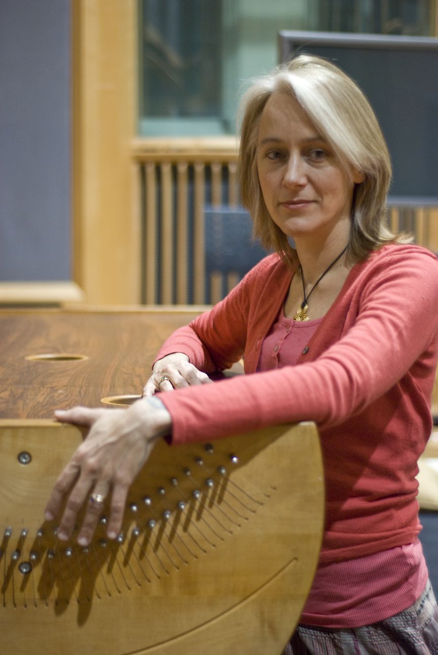 Sonia Slany standing by her monochord