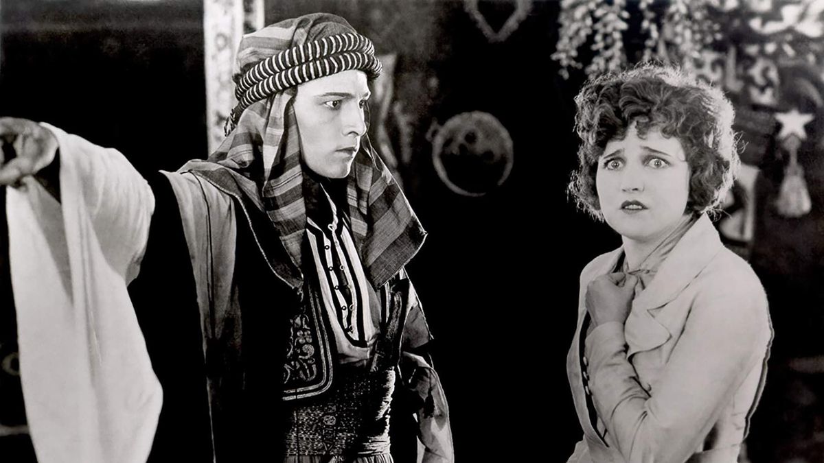 Rudolph Valentino as the Sheik and Agnes Ayres as his victim/lover in 1921’s The Sheik