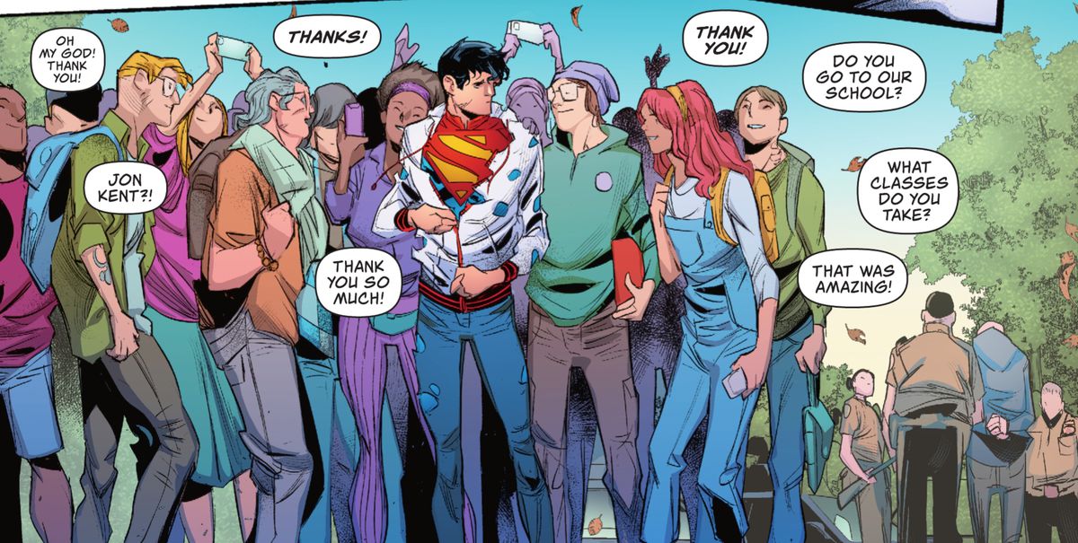 Jon Kent adjusts his bullet-ridden windbreaker — his Superman costume clearly visible, as teens swarm around him, calling him by name and thanking him in Superman: Son of Kal-El #2 (2023). 