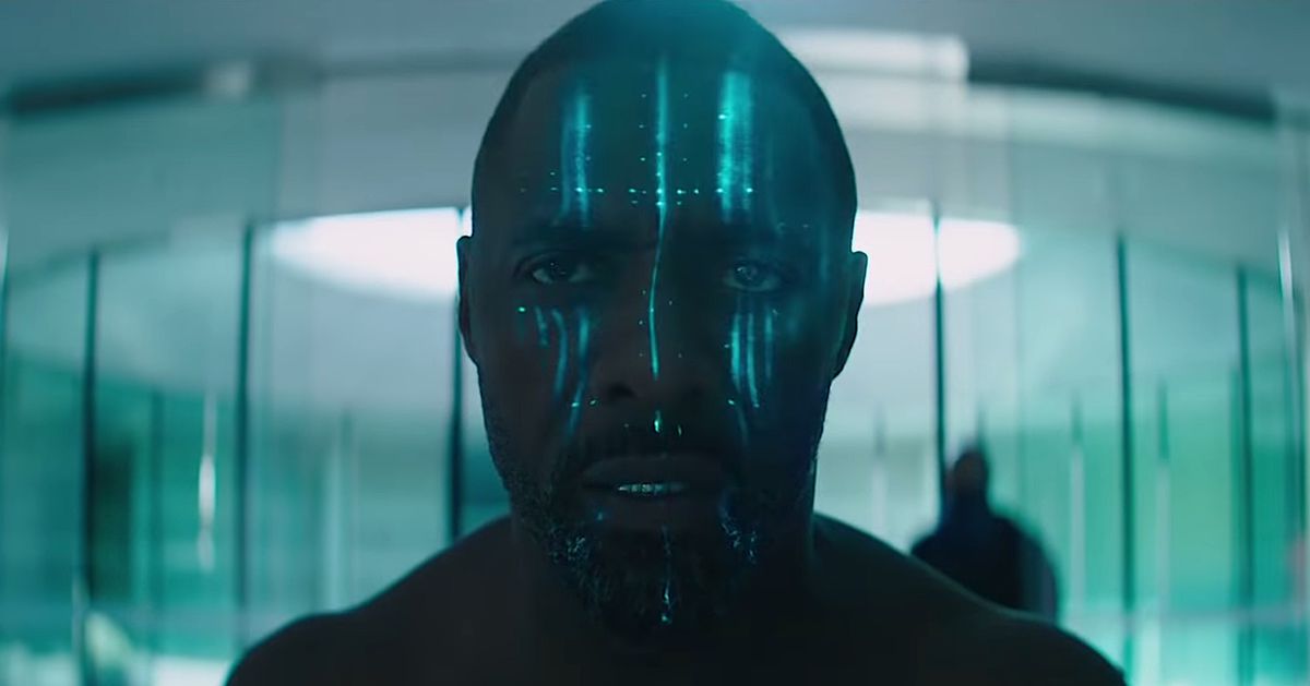 Idris Elba in Hobbs &amp; Shaw, shirtless and with blue electronic lights up and down his face
